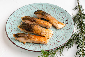 Fried carp fish slices. Traditional Polish Christmas eve dish.