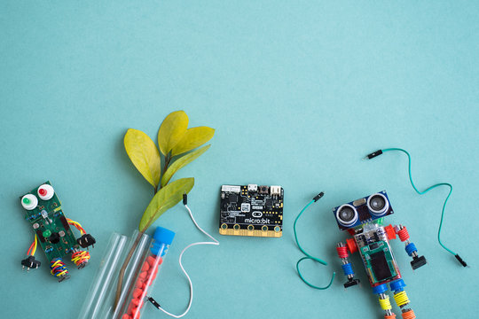 Minsk, Belarus. December, 2019. The BBC robot Micro Bit and metal robot. It can be programming on Scratch or Python. Creative, coding, learning. STEM and STEAM education. AI. DIY. Free space for text.