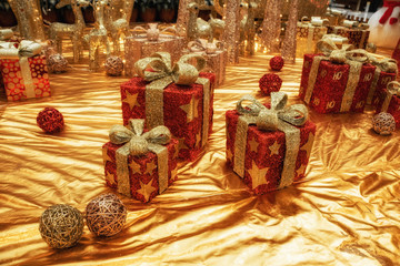 A gift box used to decorate a Christmas scene.