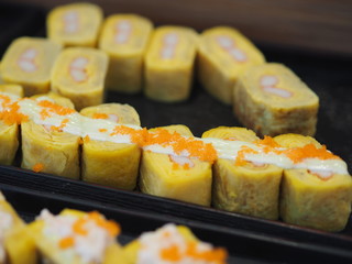 Japanese sweet egg topped with salad dressing and Shrimp eggs, Nigiri Sushi food