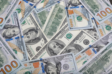 different dollar bills as background