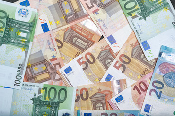 different euro bills as background