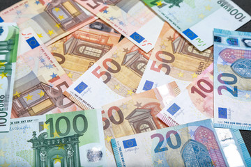 different euro bills as background