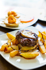 juicy steak veal beef meat with tomato and potatoes