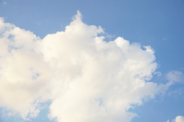 The sky with large bright white clouds