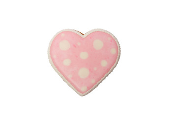 Obraz na płótnie Canvas Background from pink cookie heart shaped with different patterns, isolated