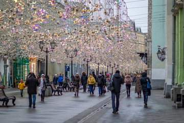 People having a rest on a background of New Year's scenery