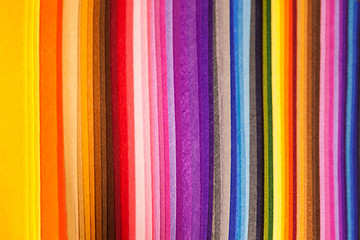multicolored sheets of paper are spread out