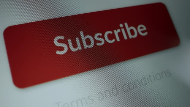 Close-up Macro Shot: Device Screen with Website Showing Red "Subscribe" Button, Cursor Clicks on Button. Mock-up Concept of Digital Service Subscription: Streaming, Application, Newsletter, Software