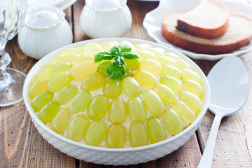 Tiffany festive salad with chicken and nuts, garnished with grapes, selective focus