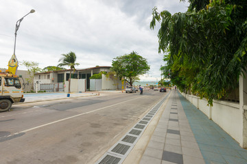 people walking by the road in Pattaya, Thailand