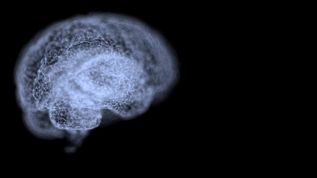 Magnetic resonance video of human brain over black background.