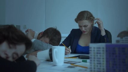 Office workers sit and sleep, woman drink coffee and try to work