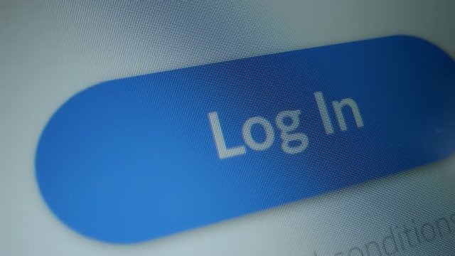 Close-up Macro Shot: Device Screen with Website Showing Blue "Log In" Button, Cursor Clicks on the Button. Mock-up Concept of Website / Social Media Access Authorization Page Asking to Enter Username 