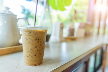 ice coffee on the table with sunlight