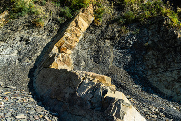 Beautiful natural texture of Caucasus mountains and rocks on the Black Sea coast in Olginka. Selective focus