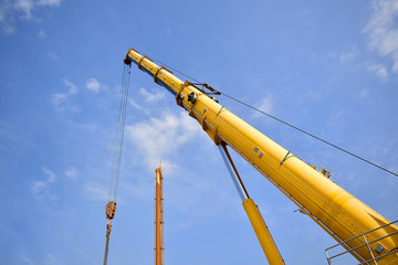 Mobile cranes working lifting equipment on construction site,Hydraulic cylinder,Boom crane.December 2019