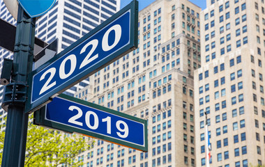 Obraz premium 2020 new year and year 2019 Streets signs. Highrise buildings background