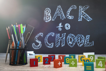 School blackboard with text 'Back to school' . September and education concept