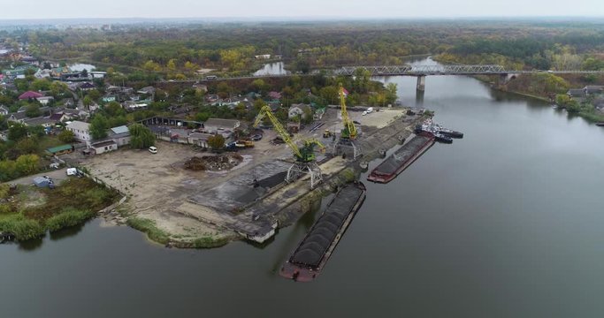 River port with cranes, view of the river port with large cranes during operation