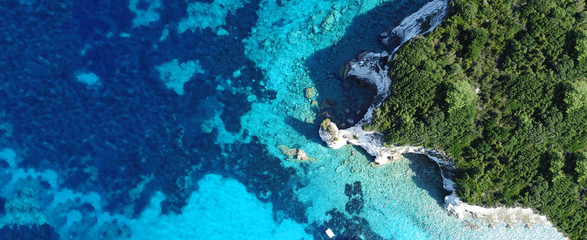 Aerial drone photo of tropical exotic destination island in Thailand with deep blue turquoise sea...