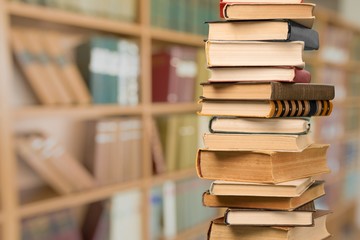 Collection stack of old retro books on background