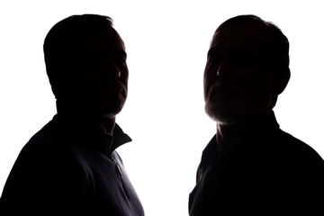 Face portrait old father and adult son opposite - silhouette, family