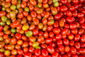 Red tomatoes. Tomato background. cherry tomato. Group of fresh tomatoes.