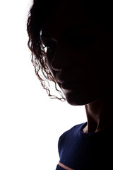 Young woman look ahead with flowing hair - silhouette
