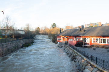 Fototapeta premium house on the waterfall on river