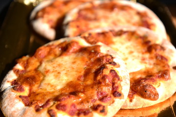 Pizza in the Plate on the Table