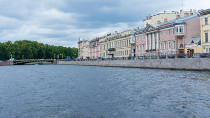 Fototapeta na wymiar Buildings on the banks of the Fontanka river in St. Petersburg