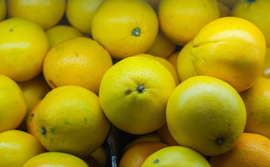 fresh lemons sales on the market. Background. natural