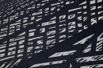 Metal fence in sunlight resembling abstract modern industrial architecture. Grid structure with lights and shadows. Technology photo featuring irregular polygonal pattern of multiple frames.