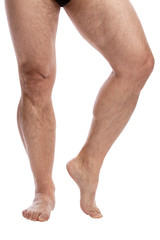 Men's legs. Isolated over white background. Vertical.