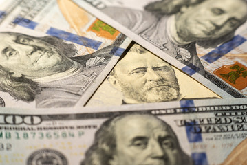 Close up of different dollar bills as background. Amarican dollars pattern. Top view of business concept.