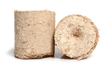 Wood briquette. Isolated on a white background.