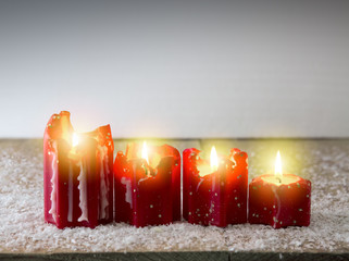Four red Christmas candle for Advent. Christmas background.