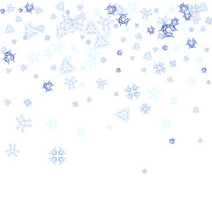 Flying snowflakes on a light blue background. Winter Abstract snowflakes. Falling snow.