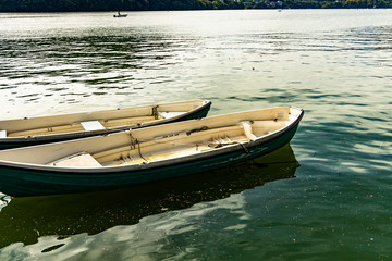 Fototapeta na wymiar two boats on the water