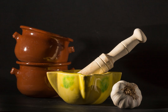 garlic, almirez and clay bowls