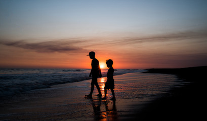 Fototapeta premium young couple at sunset