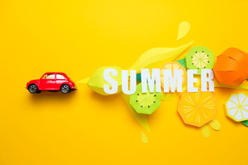 letter summer cut from paper with tropical fruit paper