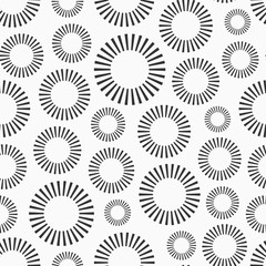 Abstract seamless pattern of repeating round ornaments isolated on white background.