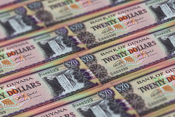 Fototapeta na wymiar GYD. Guyana currency background. Guyana dollars banknotes. Georgetown