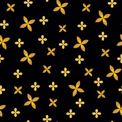 Golden quatrefoils on black background