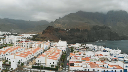 Fototapeta na wymiar Aerial view of Agaete, Gran Canaria, Spain. A small port city off the coast of the Atlantic Ocean