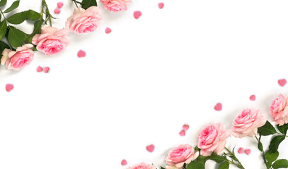 Obraz na płótnie Canvas Decoration of Valentine Day. Frame of beautiful flowers pink roses and pink hearts with space for text on white background. Top view, flat lay