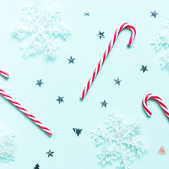 Christmas flat lay composition. Set of holiday decorations on a neo mint background, Christmas...