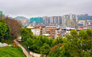 Panoramic view of Macao business downtown and residential buildings quarter reflex